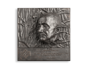 Donkere bronzen plaquette met portrret van oudere man